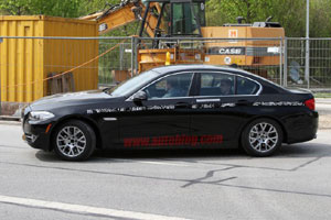 Гибридная "пятерка" BMW сбрасывает камуфляж 